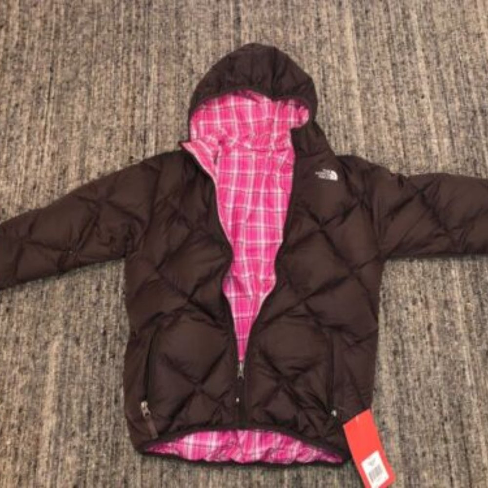 New with tags, authentic 
North Face Girls Jacket Reversible Brown/ pink